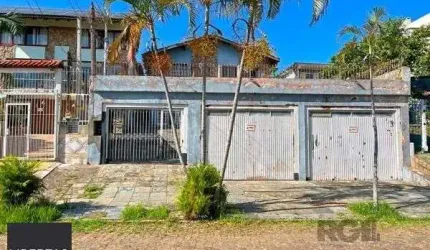 Casa em Porto Alegre, no bairro Tristeza, com 4 dormitório(s), à venda.