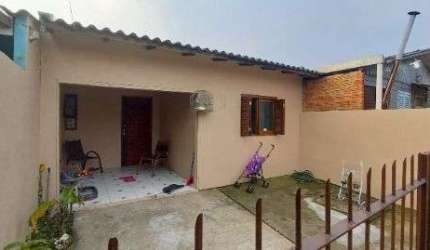 Casa em Porto Alegre, no bairro Ponta Grossa, com 2 dormitório(s), e 2 banheiros, à venda.