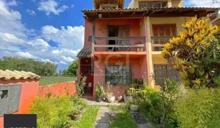 Casa em Porto Alegre, no bairro Hípica, com 2 dormitório(s), e 2 banheiros, à venda.