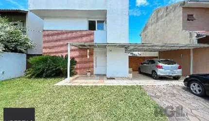 Casa em Porto Alegre, no bairro Hípica, com 3 dormitório(s), e 3 banheiros, à venda.