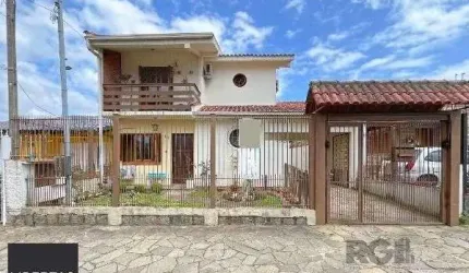 Casa em Porto Alegre, no bairro Aberta dos Morros, com 3 dormitório(s), à venda.