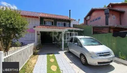 Casa em Porto Alegre, no bairro Ipanema, com 3 dormitório(s), e 3 banheiros, à venda.
