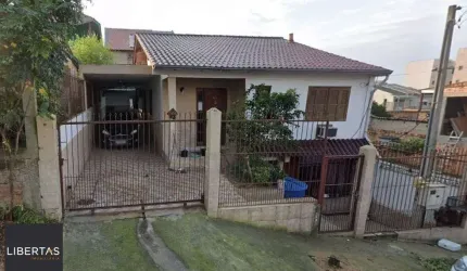 Casa no bairro Santa Fé com 3 dormitórios e 3 vagas