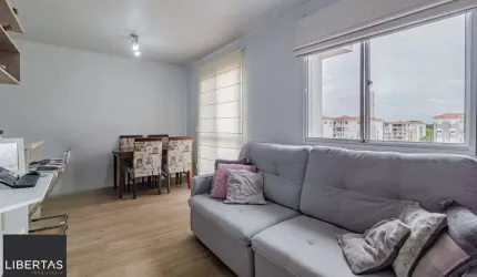 Apartamento com 2 dormitórios e 1 vaga de garagem escriturada no Bairro Humaitá