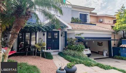 CASA DE 4 DORMITÓRIOS EM CONDOMÍNIO - 320 m² - 4 VAGAS DE GARAGEM