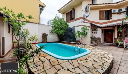 Casa com 3 suítes e 4 vagas no Bairro Boa Vista