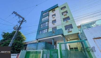 2 dormitórios, 1 suíte e 2 vagas de garagem
