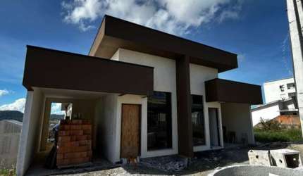 Casa com 3 quartos à venda na Travessa Osny Ubaldo Correia, 12, Forquilhas, São José por R$ 800.000