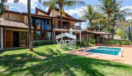 CASA VENDO EM CAMPINAS, NO DISTRITO DE SOUSAS, CONDOMÍNIO COLINAS DO ERMITAGE COM 4 SUÍTES.
