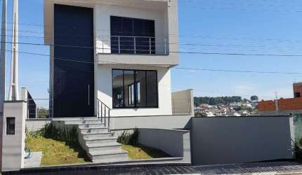Casa no condomínio Arujazinho IV com 3 suítes e piscina - Arujá