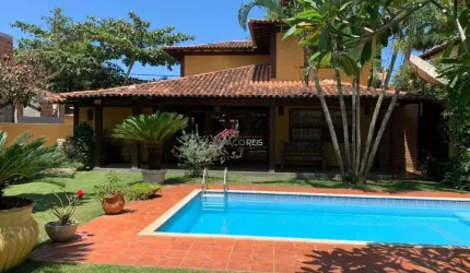 MANGUINHOS A POUCOS METROS DA PRAIA , COM 4 QUARTOS E DEPENDENCIA.