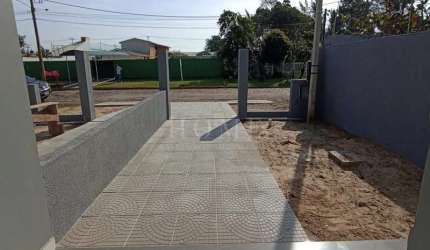 CASA COM 2 DORMITORIOS!