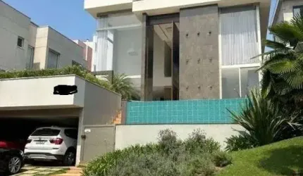CASA DE ALTO PADRÃO COM 390 M²/4 SUITES/4 VAGAS/ ÁREA GOURMET/PISCINA PARA ALUGAR EM CONDOMINIO FECHADO EM ALPHAVILLE