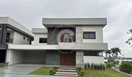 Sobrado com 3 dormitórios à venda, 325 m² por R$ 2.500.000,00 - Condomínio Terras