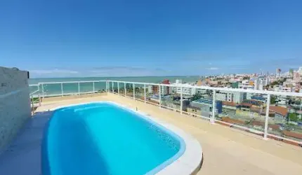 Apartamento novo de 02 quartos à 100m do mar