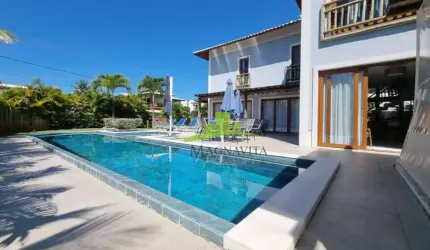 Casa de luxo em Guarajuba com 8 suítes, piscina privativa e 100% climatizada no Condomínio PARAÍSO. Lote de esquina, próxima à praia. Segurança 24hs.