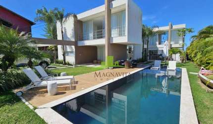Casa à venda em Busca Vida, Buscaville, 4 suítes, 480m², piscina, área gourmet, 6 vagas. Condomínio com lazer completo.