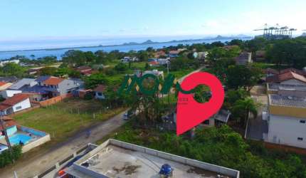 Terreno em Itapoá, 300 metros do mar, pouca vegetação e cercado