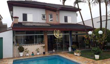 Sobrado com 4 dormitórios à venda, 370 m² por R$ 2.300.000,00 - Condomínio Village Taubaté - Taubaté/SP