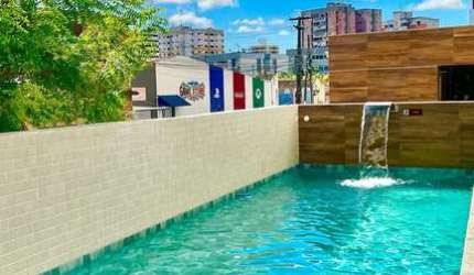 Apartamento novo com 2 quartos a poucos passos da praia 