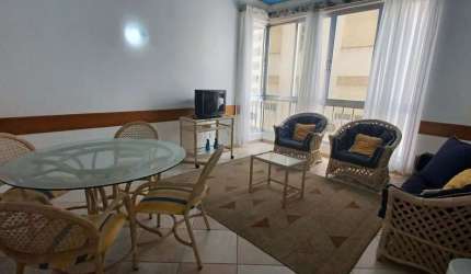 Apartamento alto padrão com 2 dormitórios sendo 1 suíte + suíte de serviço em frente a praia da Pitangueiras-Guarujá/SP.