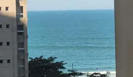Apartamento alto padrão com acesso a sacada vista parcial mar, 2 dormitórios sendo 1 suíte, á 200 metros do mar - ASTÚRIAS-Guarujá/SP.