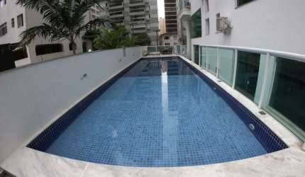 Apartamento alto padrão com 3 suítes, sacada gourmet envidraçada e lazer completo a menos de 150 metros da Praia das Pitangueiras-Guarujá/SP.