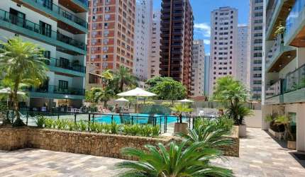Apartamento com vista parcial do mar na praia da Pitangueiras-Guarujá/SP.