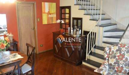 Sobrado com 3 dormitórios à venda, 122 m² por R$ 1.500.000,00 - Ponta da Praia - Santos/SP