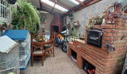 Casa com 3 dormitórios à venda, 135 m² por R$ 600.000,00 - Balneário Pires - Praia Grande/SP
