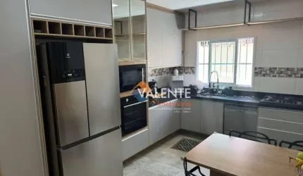 Casa com 3 dormitórios à venda, 120 m² por R$ 1.156.000,00 - Balneário Pires - Praia Grande/SP