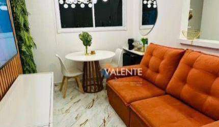 Apartamento com 2 dormitórios à venda, 46 m² por R$ 320.000,00 - Areia Branca - Santos/SP