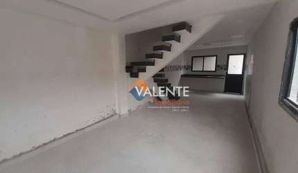 Sobrado com 3 dormitórios à venda, 108 m² por R$ 750.000,00 - Caiçara - Praia Grande/SP