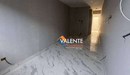 Casa com 2 dormitórios à venda, 70 m² por R$ 390.000,00 - Tude Bastos - Praia Grande/SP