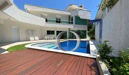 Casa em condomínio fechado com 5 suítes, piscina e area gourmet a poucos metros da praia do Pernambuco