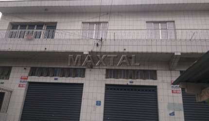 Prédio Comercial à Venda Itaberaba, com casa de 3 quartos e 3 lojas, com garagem.