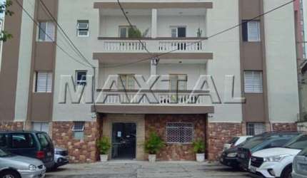 Apartamento à venda com 2 dormitórios, sala e garagem rotativa, em Santana.