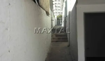 Terreno em Santa Terezinha com 228m², possui 3 casas com 127m² de área construída