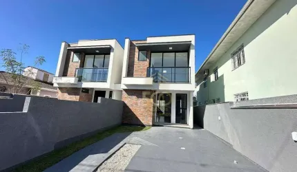 Sobrado com 3 dormitórios sendo uma suíte e duas demi-suíte à venda, 112 m² por R$ 690.000 - Areias - São José/SC