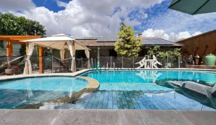 Casa com 3 suítes + 1 quarto à venda, 430 m² por R$ 3.200.000 - Zona 02 - Maringá/PR