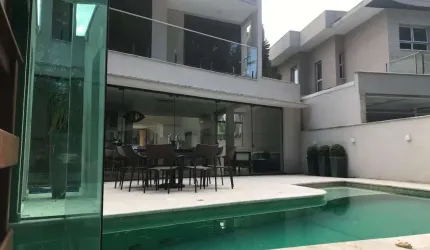 Casa com 5 dormitórios à venda, 419 m² por R$ 10.000.000,00 - Riviera Módulo 21 - Bertioga/SP
