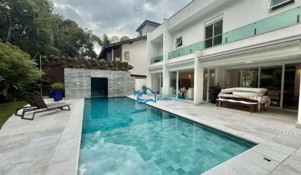 Casa com 4 dormitórios, 322 m² - venda por R$ 4.800.000,00 ou aluguel por R$ 24.000,00/mês - Riviera Módulo 30 - Bertioga/SP