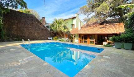 Casa com 4 quartos à venda na Rua Edgar Luiz Schneider, 460, Jardim Isabel, Porto Alegre por R$ 1.540.000