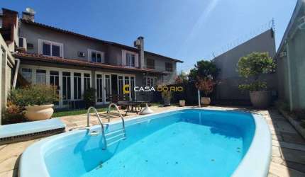 Casa com 3 quartos à venda na Rua Fortunato Della Casa, 45, Espírito Santo, Porto Alegre por R$ 958.000