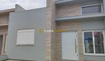 Casa em condomínio fechado com 2 quartos à venda na Rua Jean Vardaramatos, 130, Hípica, Porto Alegre por R$ 495.000