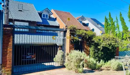Casa com 3 quartos à venda na Rua General Tadeusz Kosciuszko, 38, Jardim Isabel, Porto Alegre por R$ 1.490.000