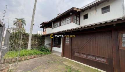 Casa com 3 quartos à venda na Rua Mampituba, 246, Ipanema, Porto Alegre por R$ 650.000