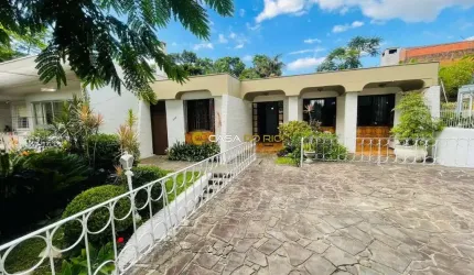 Casa com 4 quartos à venda na Avenida Pereira Passos, 756, Vila Assunção, Porto Alegre por R$ 1.300.000