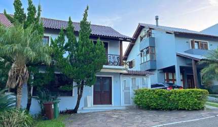 Casa em condomínio fechado com 3 quartos à venda na Avenida Edgar Pires de Castro, 540, Hípica, Porto Alegre por R$ 895.000