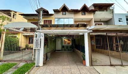 Casa com 2 quartos à venda na Rua Azise Pedro Falcão, 42, Hípica, Porto Alegre por R$ 410.000